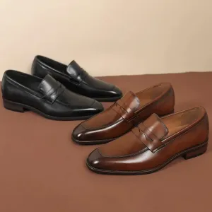 TREKHE | Classic Black & Brown Penny Loafer – Everyday Elegance